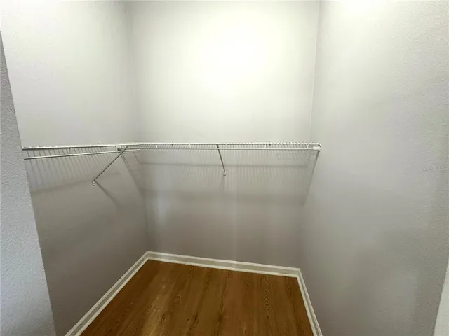 a view of a room with racks on the wall