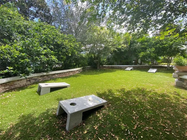 a view of a yard with an outdoor space