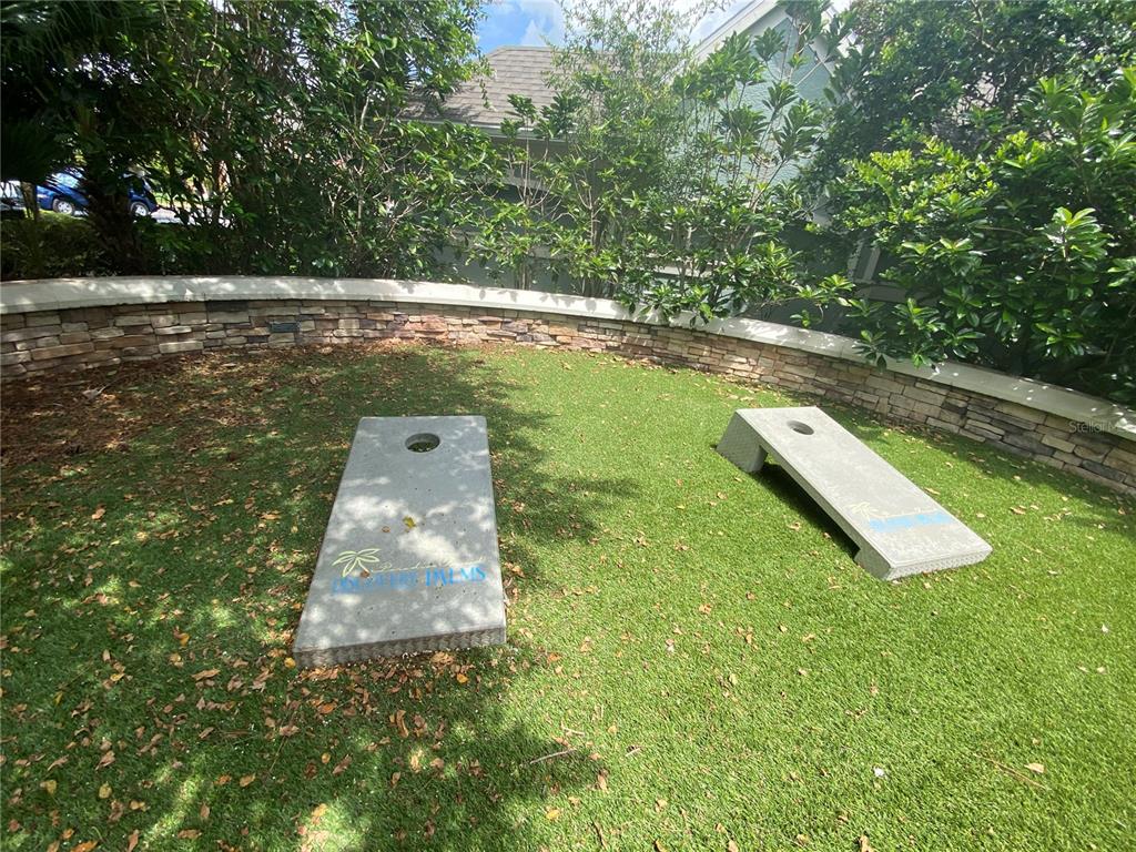 12843 Madison Pointe Circle, Unit 201 Orlando, FL 32821 - Photo 38 of 53 a view of a lake with a yard