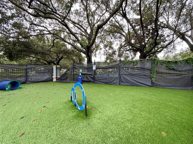 a view of an outdoor space and tennis court