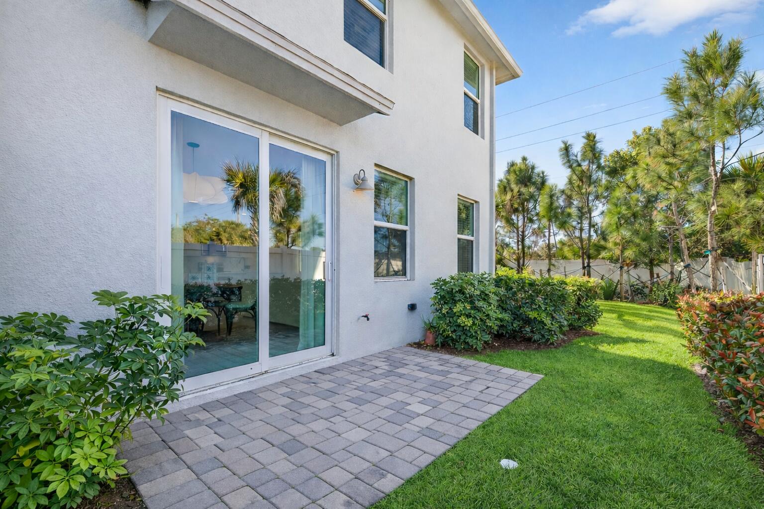 5624 Southeast Edgewater Circle Stuart, FL 34997 - Photo 29 of 33 a front view of a house with garden