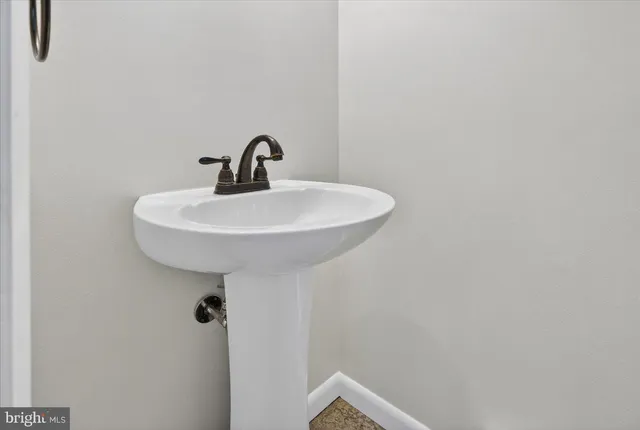 a view of a house with a yard and garage