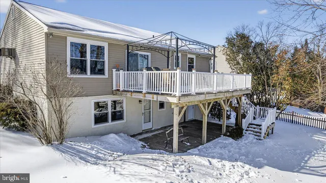 a view of a balcony with furniture