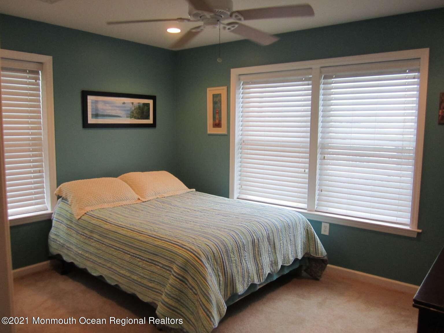111 Marlin Road Tuckerton, NJ 08087 - Photo 11 of 23 a bedroom with a bed and a window