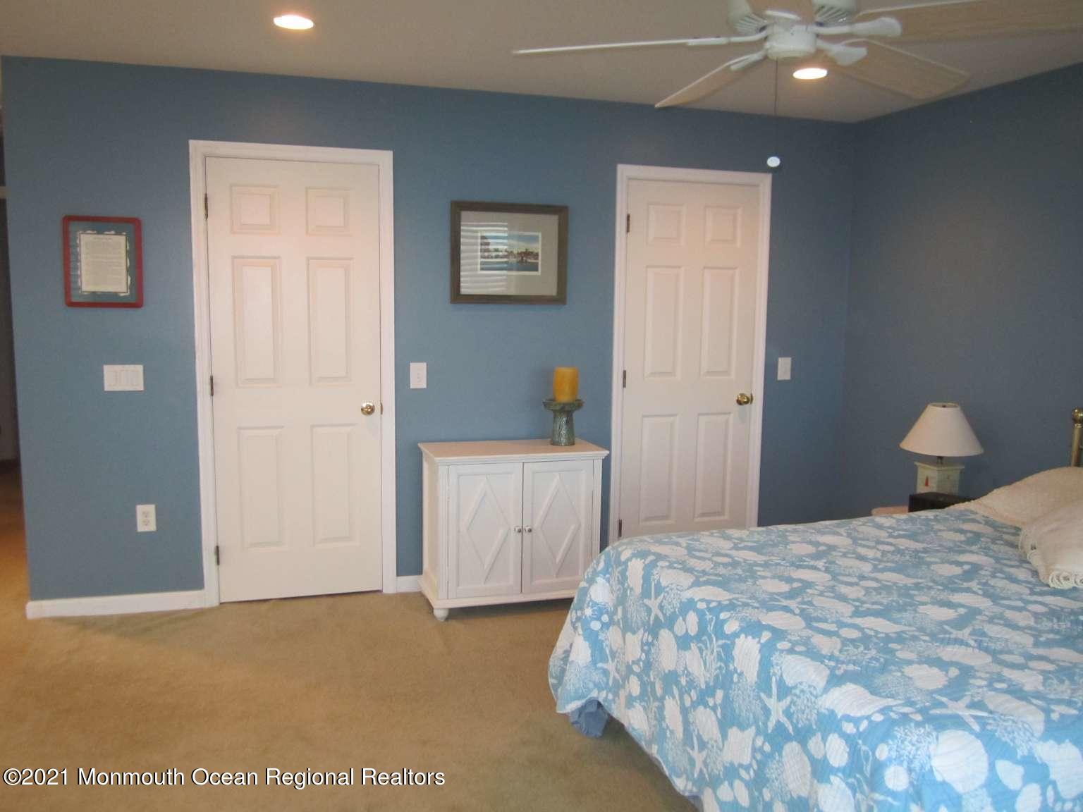 111 Marlin Road Tuckerton, NJ 08087 - Photo 16 of 23 a bedroom with a bed and a painting on the wall