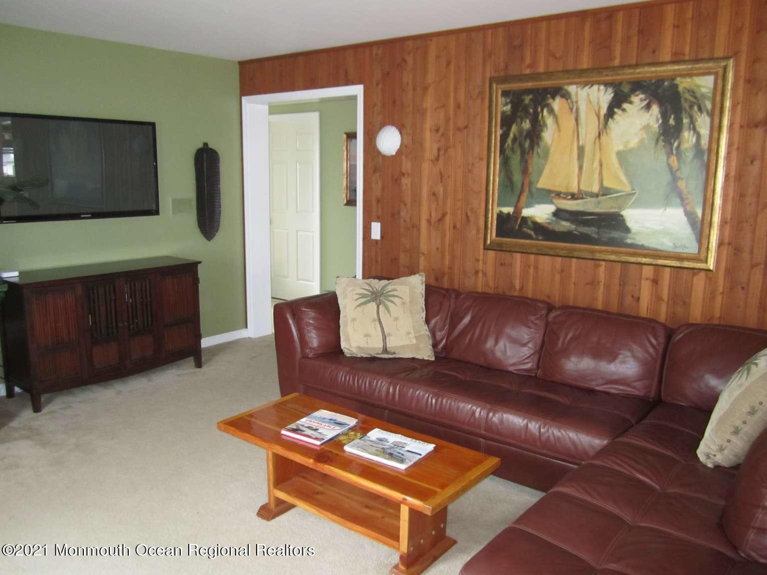 111 Marlin Road Tuckerton, NJ 08087 - Photo 3 of 23 a living room with furniture and a flat screen tv