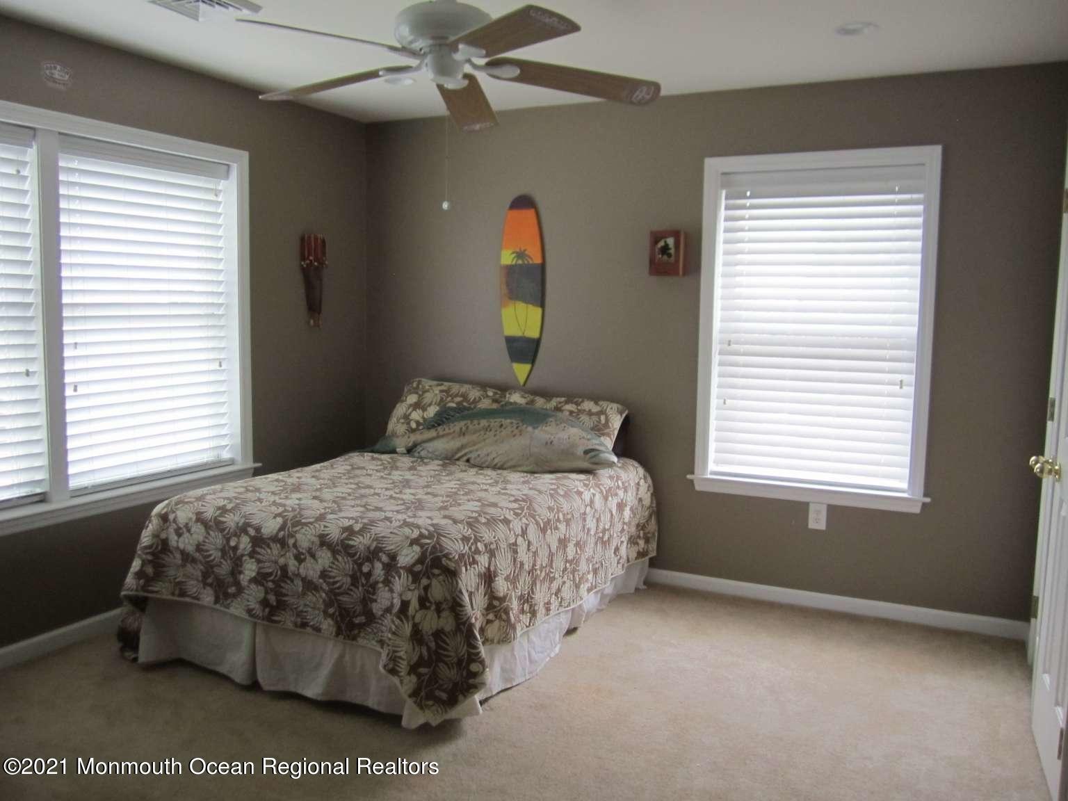 111 Marlin Road Tuckerton, NJ 08087 - Photo 9 of 23 a bedroom with a bed and a window