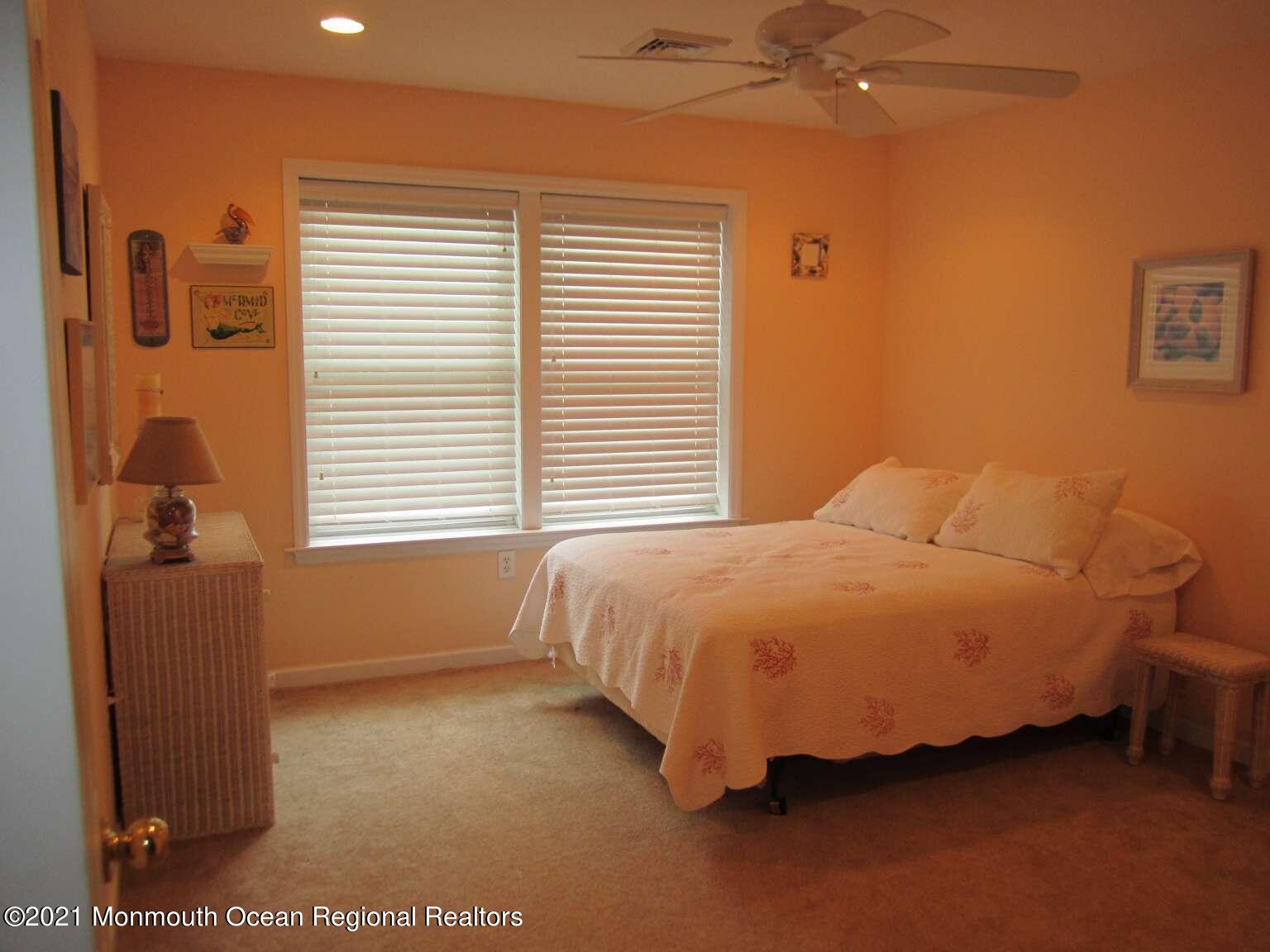 111 Marlin Road Tuckerton, NJ 08087 - Photo 10 of 23 a bed sitting in a bedroom next to a window