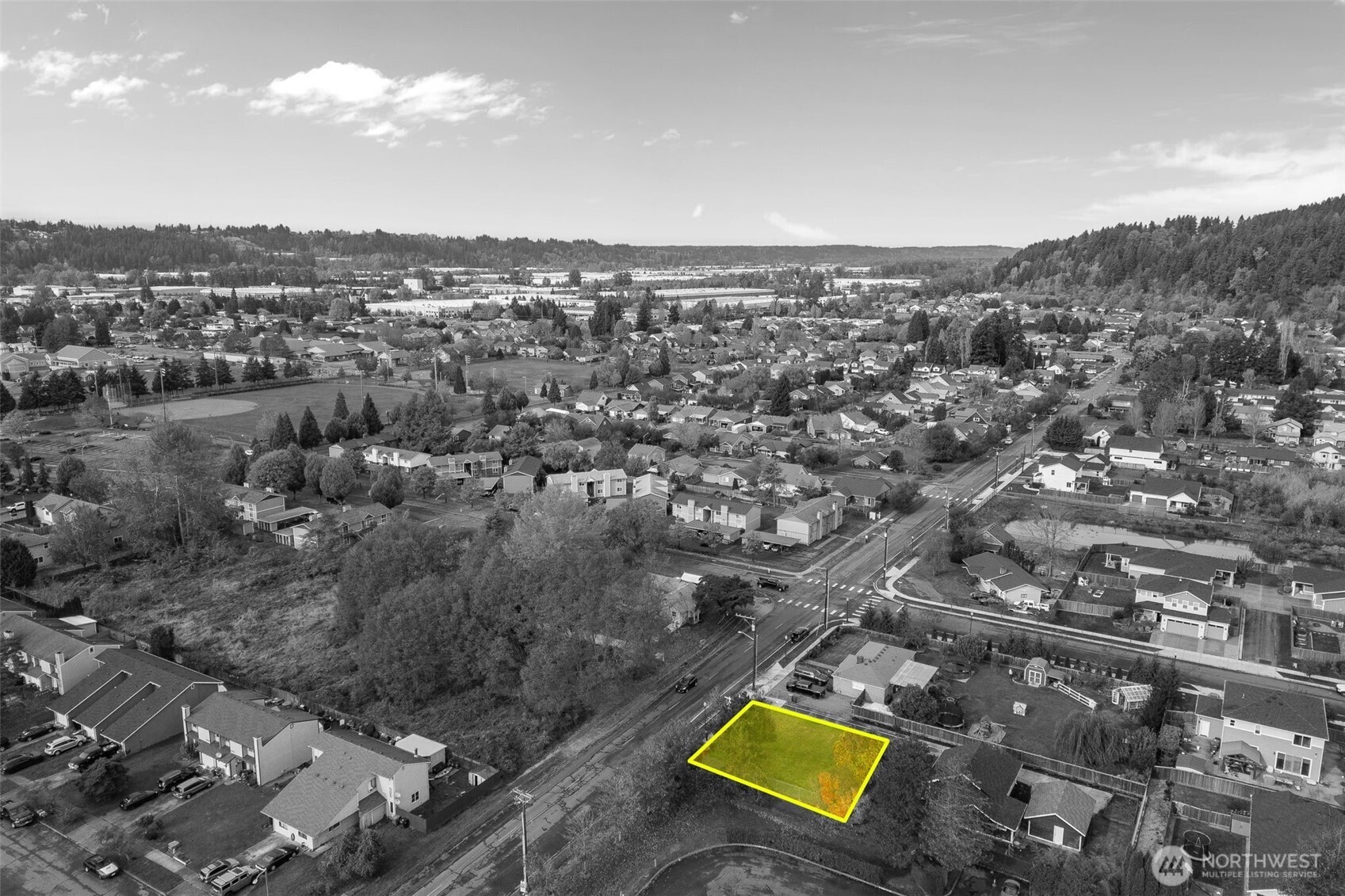 5703 Parker Road East, Unit 1 Sumner, WA 98390 - Photo 9 of 10 an aerial view of a residential houses with city view