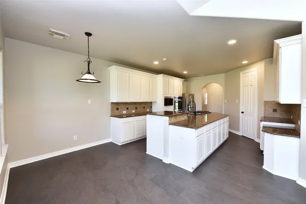 a bathroom with 2 sink and a mirror