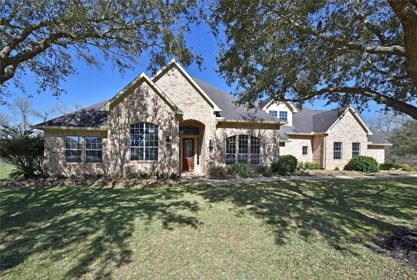 a view of entryway with stairs and wooden floor