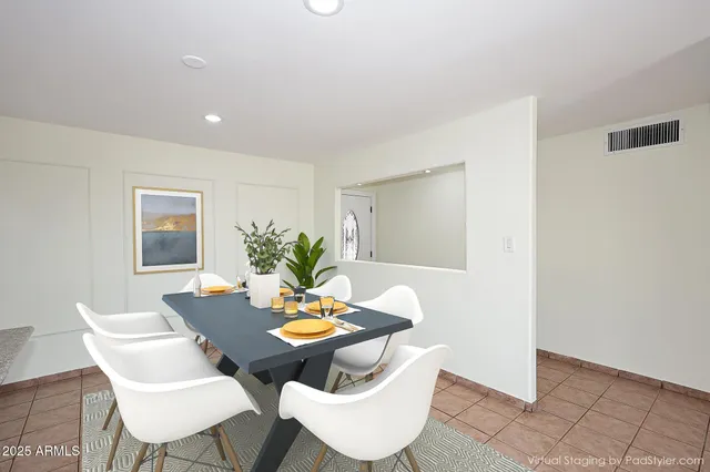 a view of a dining room with furniture