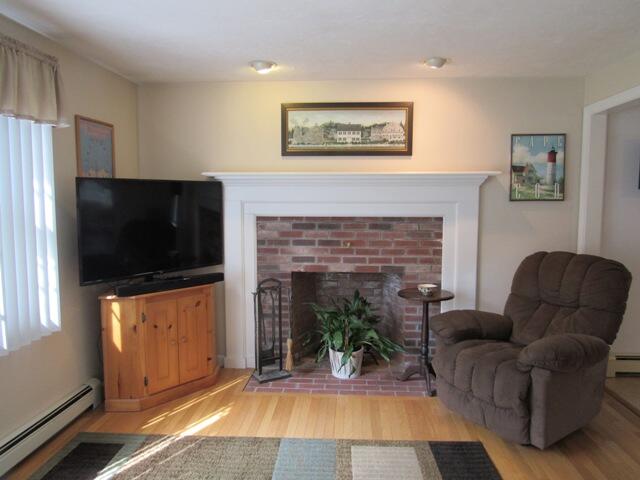 12 Yearling Run Road Buzzards Bay, MA 02532 - Photo 13 of 36 a living room with furniture and a flat screen tv