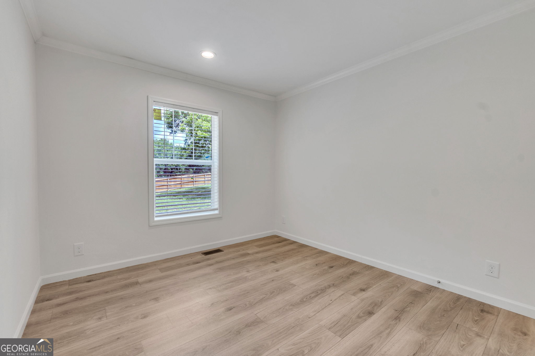 108 Old River Road Iva, SC 29655 - Photo 21 of 31 a view of an empty room with wooden floor and a window