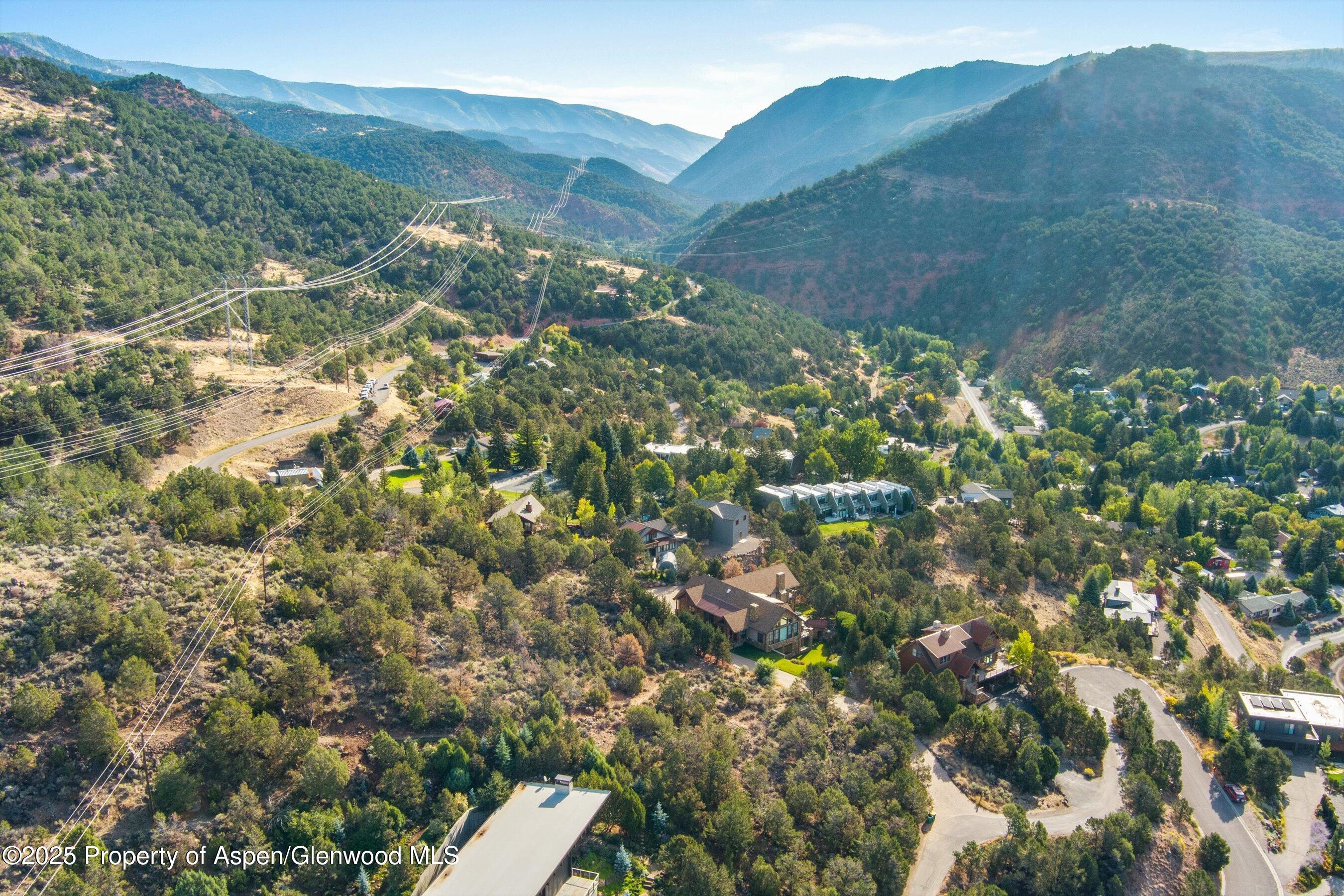 204 Ridge Road Basalt, CO 81621 - Photo 11 of 12 a view of a house with a mountain and a forest