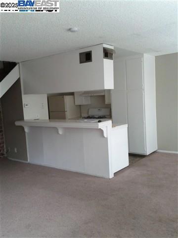 Undisclosed Address Pleasanton, CA 94588 - Photo 2 of 17 a utility room with dryer and washer