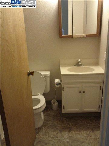 Undisclosed Address Pleasanton, CA 94588 - Photo 10 of 17 a bathroom with a sink and a toilet