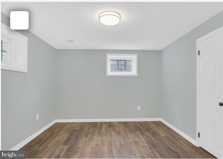 6701 Furman Parkway Riverdale, MD 20737 - Photo 3 of 9 an empty room with a window