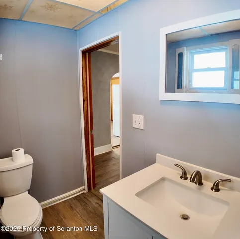 a bathroom with a sink and a toilet