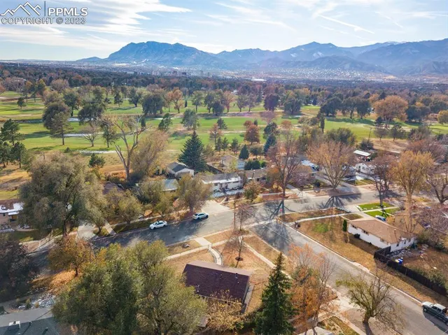 a house with trees in the background