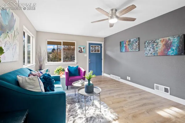 a living room with furniture and window