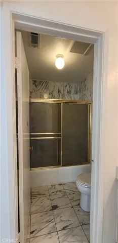 a bathroom with a toilet