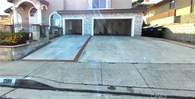 a view of a living room and entry way