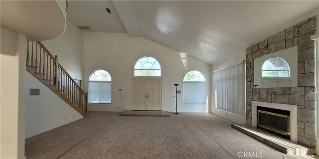 a view of a livingroom with a fireplace