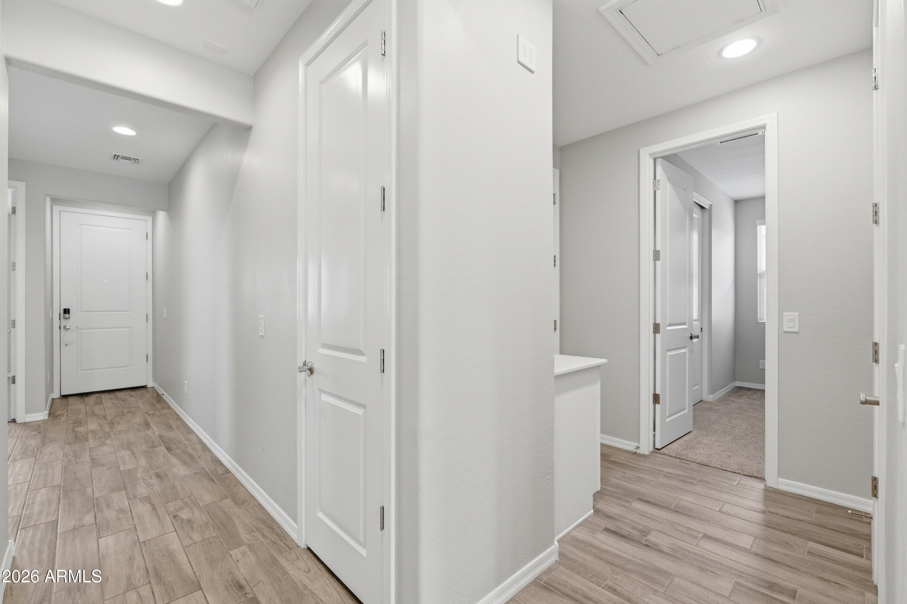 22445 East Marsh Road Queen Creek, AZ 85142 - Photo 17 of 71 a view of a hallway with wooden floor