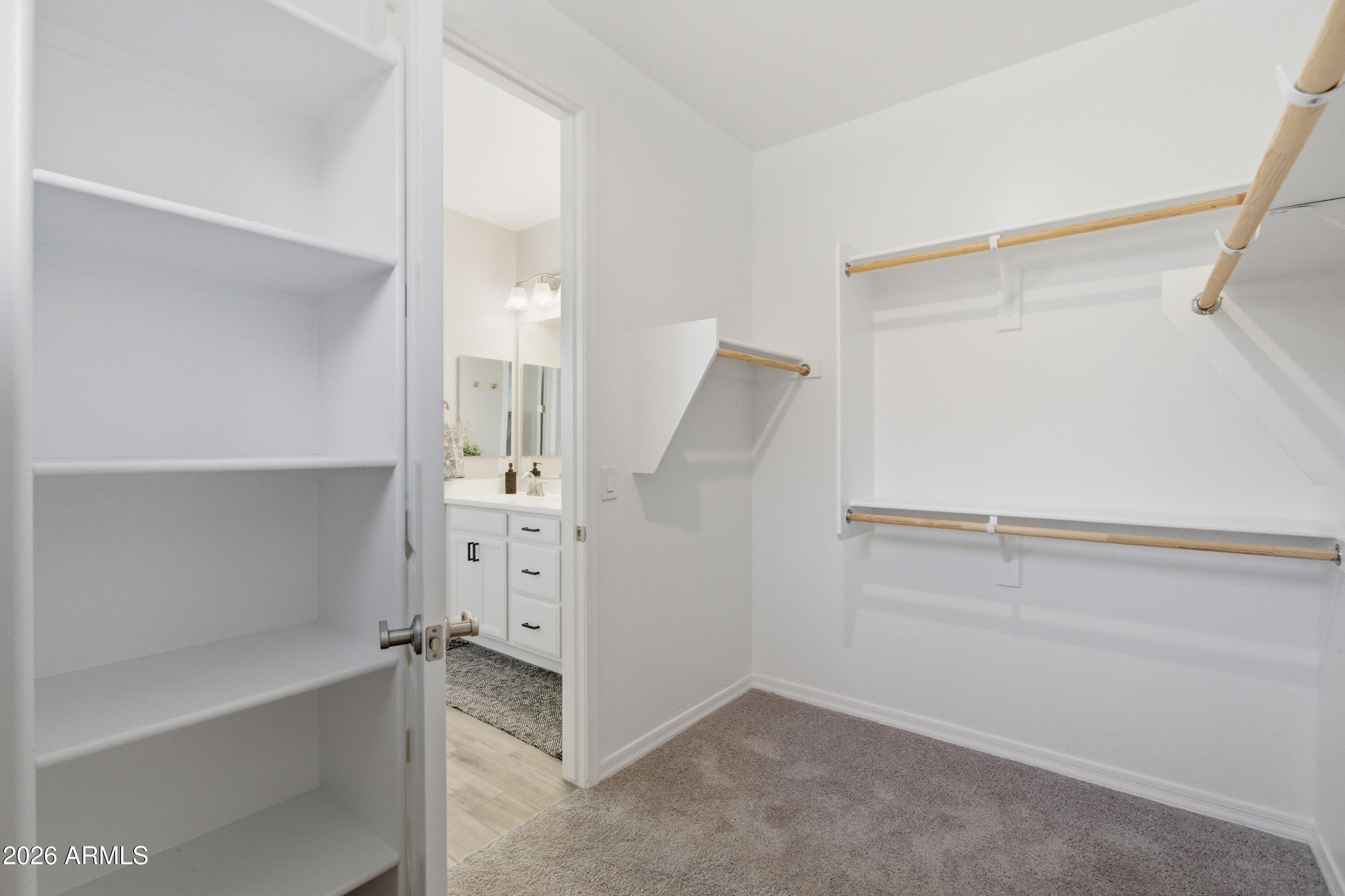 22445 East Marsh Road Queen Creek, AZ 85142 - Photo 44 of 71 a view of an empty walk in closet