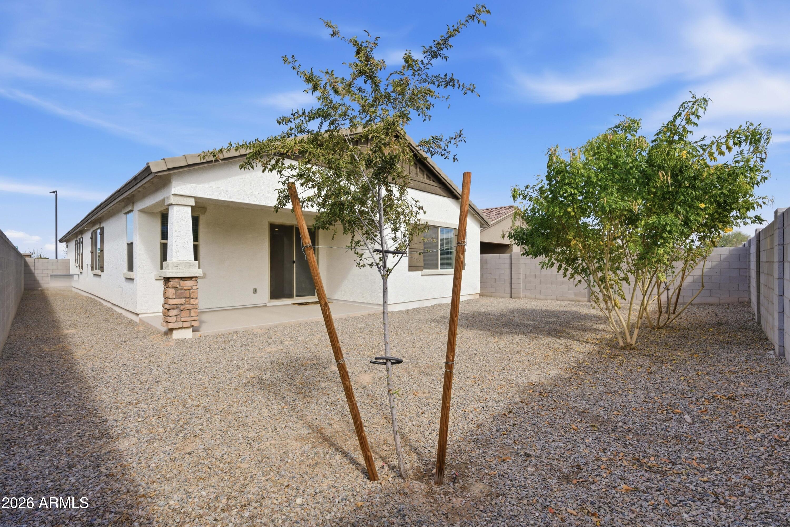 22445 East Marsh Road Queen Creek, AZ 85142 - Photo 48 of 71 a view of a house with a tree