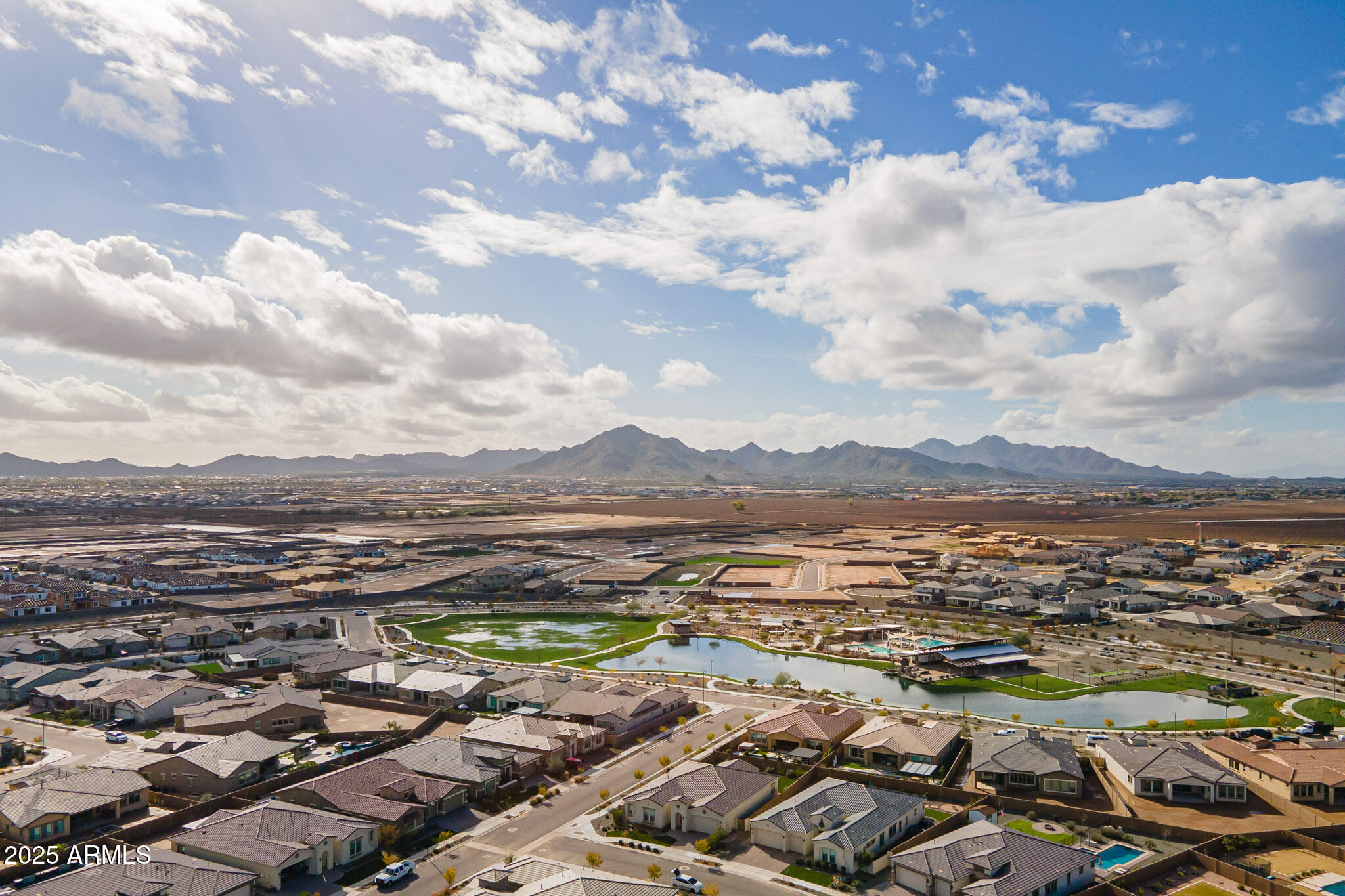 22445 East Marsh Road Queen Creek, AZ 85142 - Photo 52 of 71 an aerial view of residential houses with outdoor space