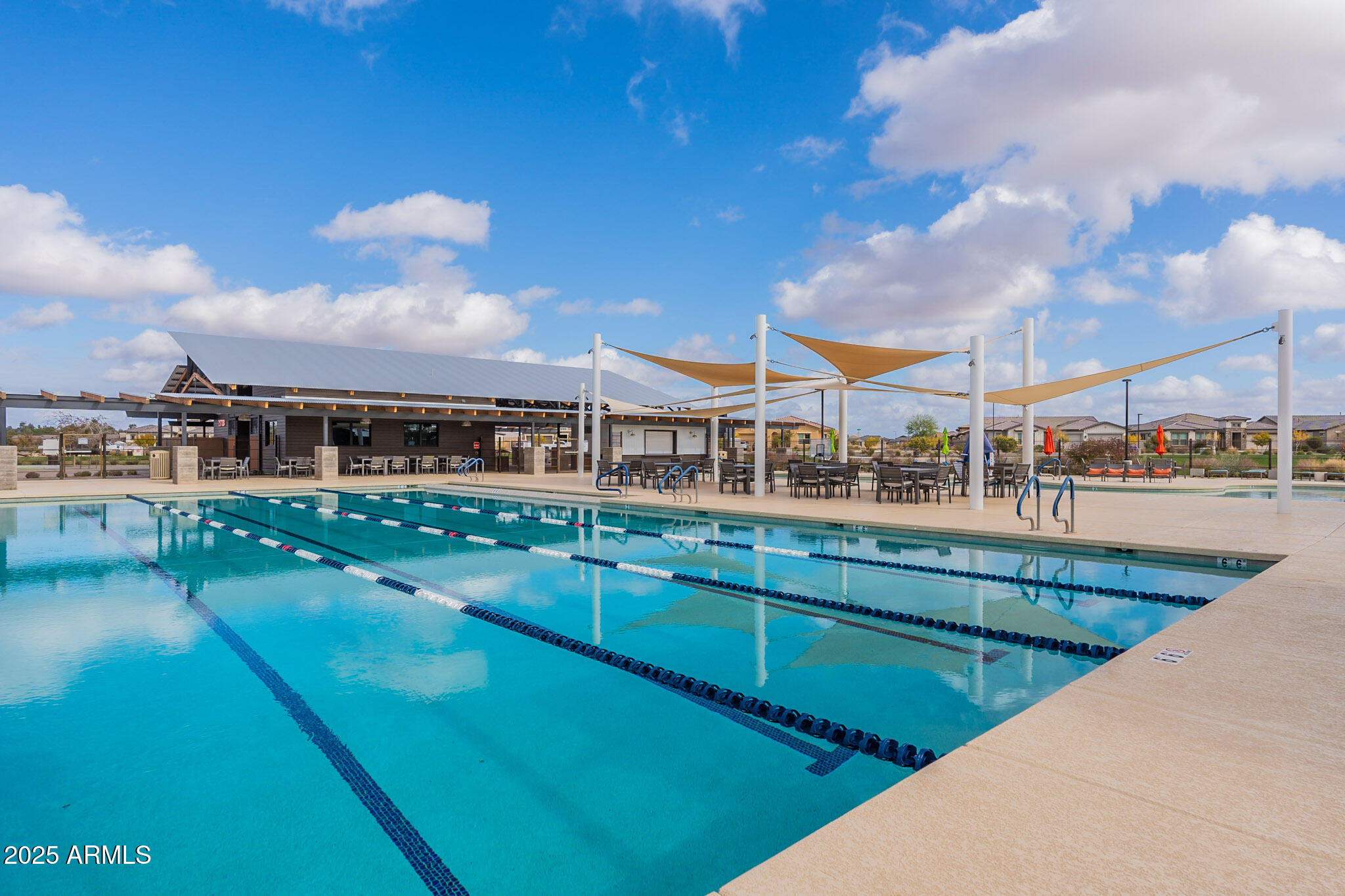 22445 East Marsh Road Queen Creek, AZ 85142 - Photo 55 of 71 a view of a swimming pool and an outdoor seating