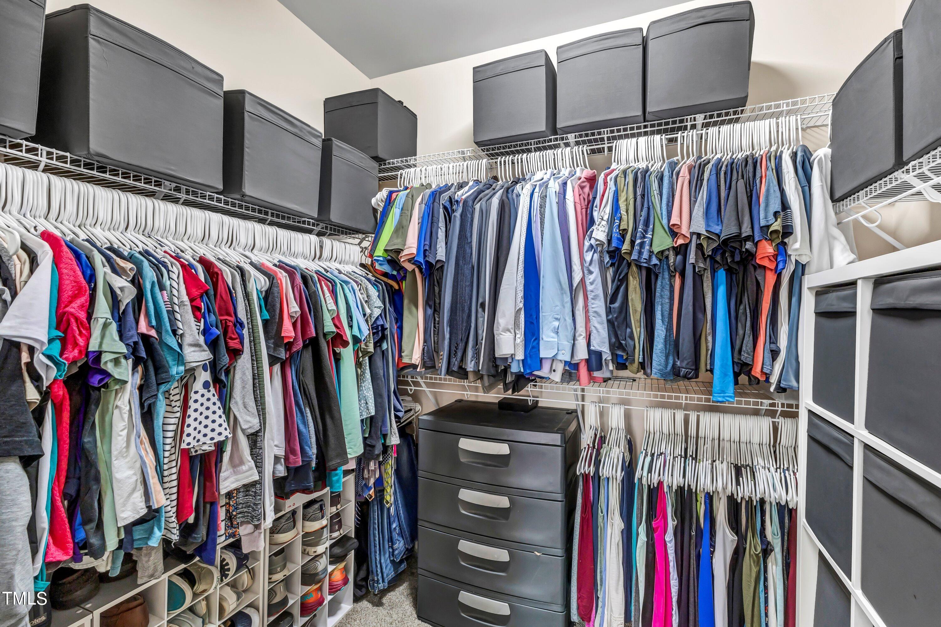 4151 White Kestrel Drive Raleigh, NC 27616 - Photo 21 of 37 a view of walk in closet with clothes