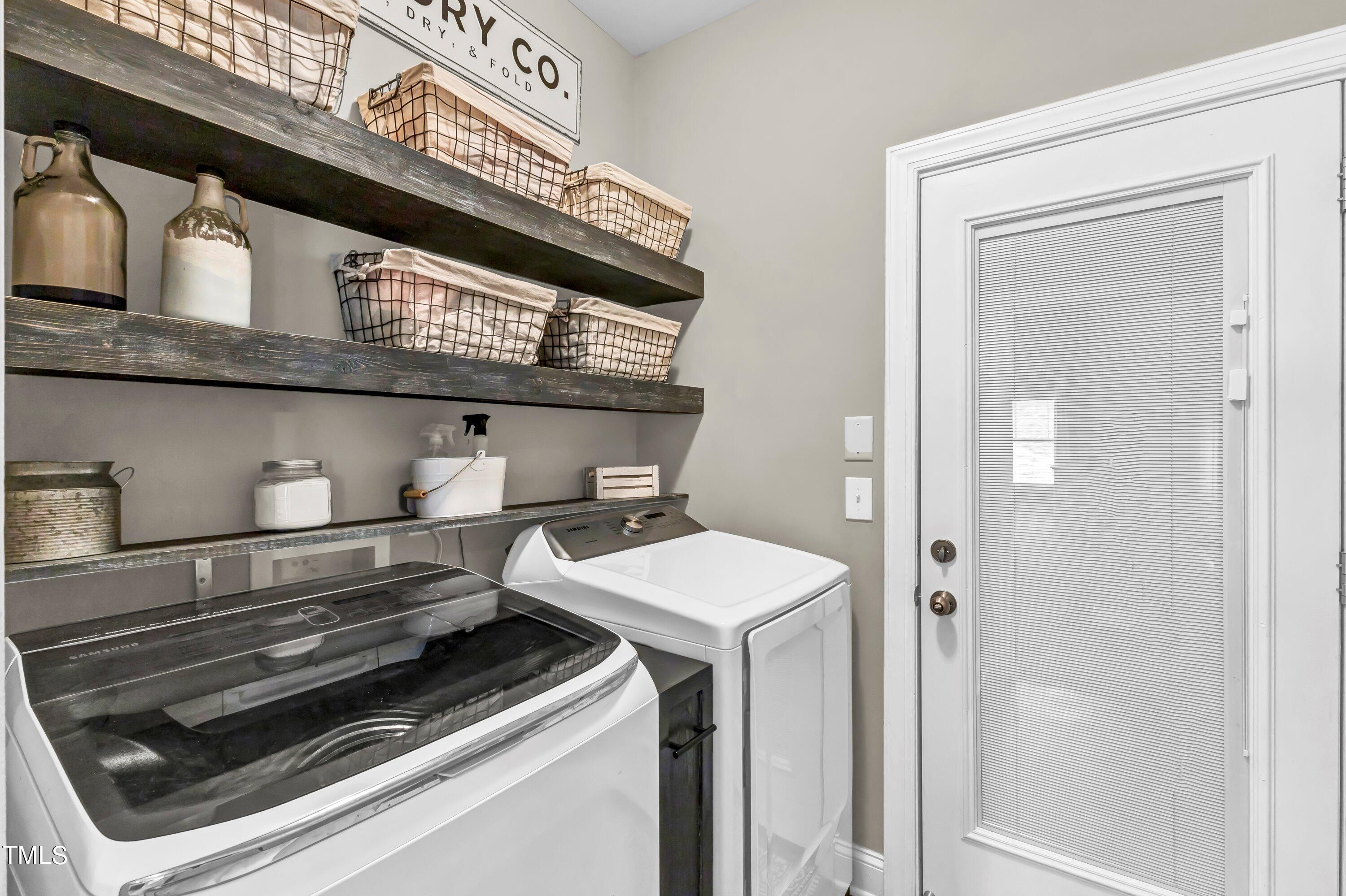 4151 White Kestrel Drive Raleigh, NC 27616 - Photo 32 of 37 a utility room with dryer and washer