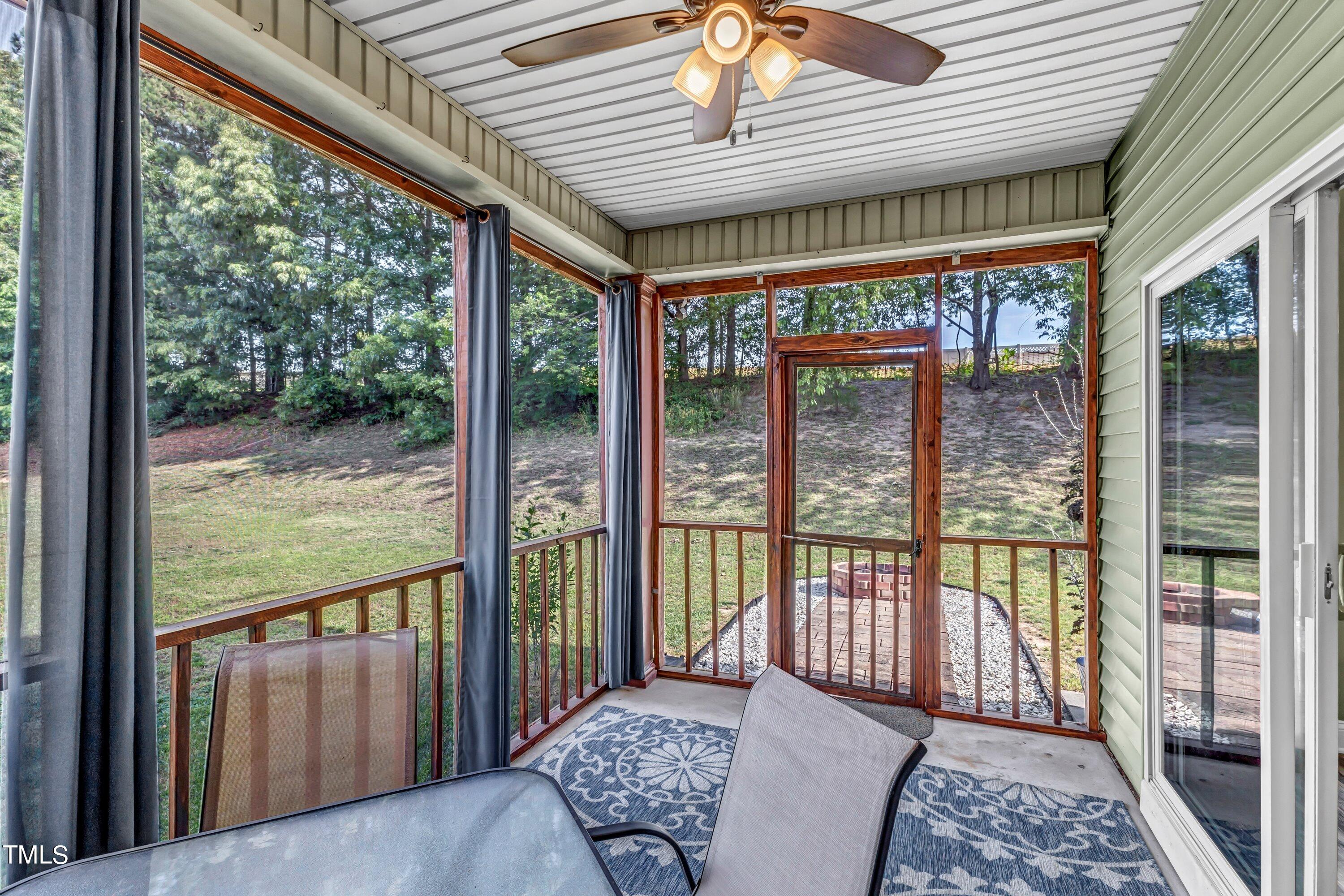 4151 White Kestrel Drive Raleigh, NC 27616 - Photo 33 of 37 a balcony with furniture and wooden deck