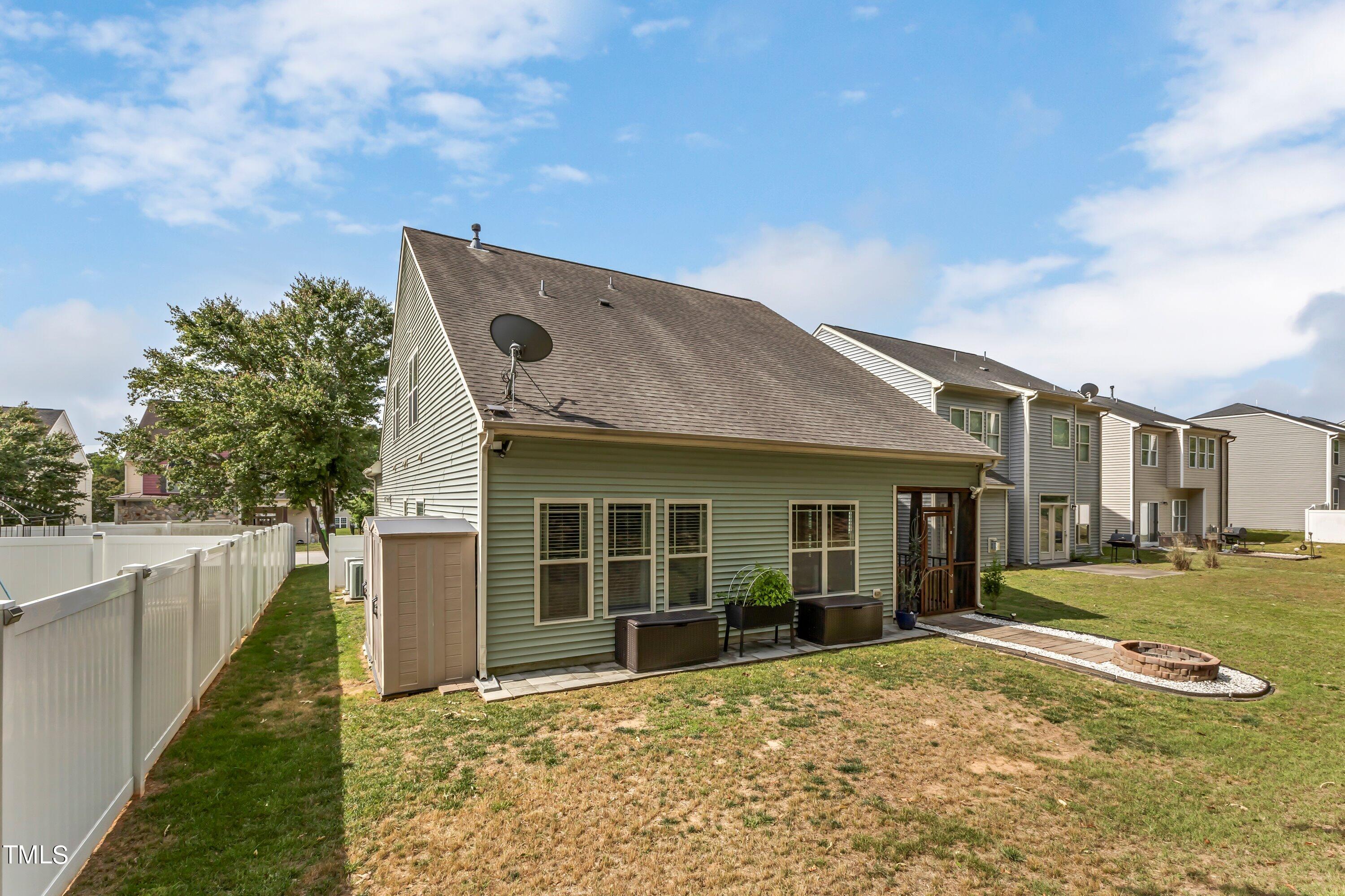 4151 White Kestrel Drive Raleigh, NC 27616 - Photo 34 of 37 a front view of a house with a yard