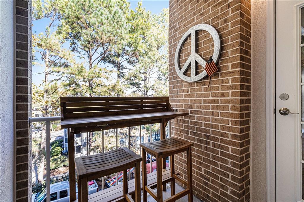 220 Renaissance Parkway Northeast, Unit 1211 Atlanta, GA 30308 - Photo 18 of 24 a door view with a outdoor seating space
