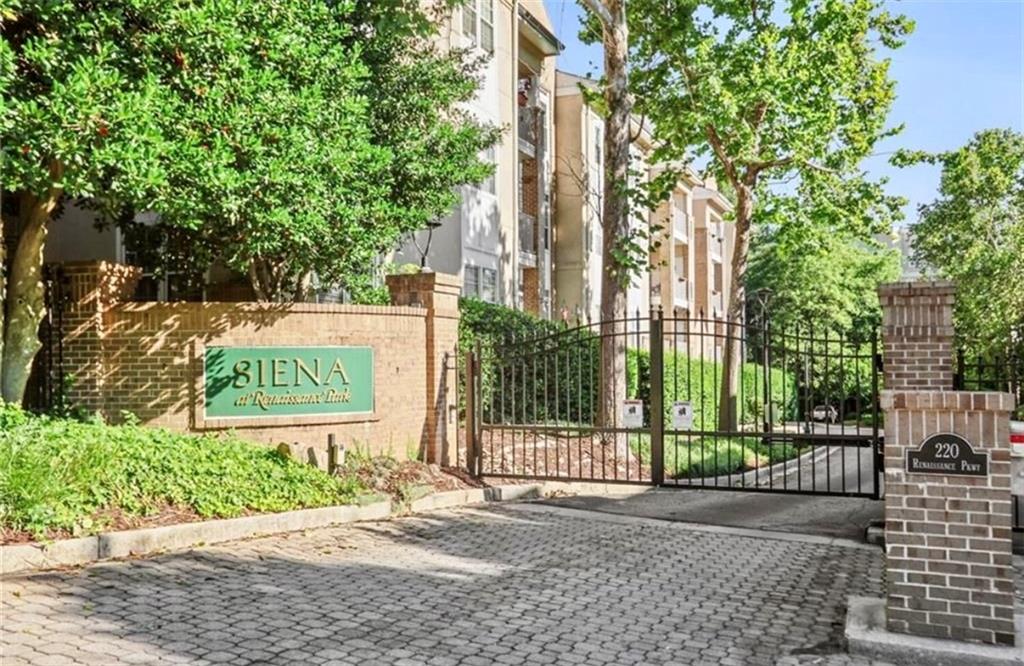 220 Renaissance Parkway Northeast, Unit 1211 Atlanta, GA 30308 - Photo 24 of 24 a sign on the side of a road