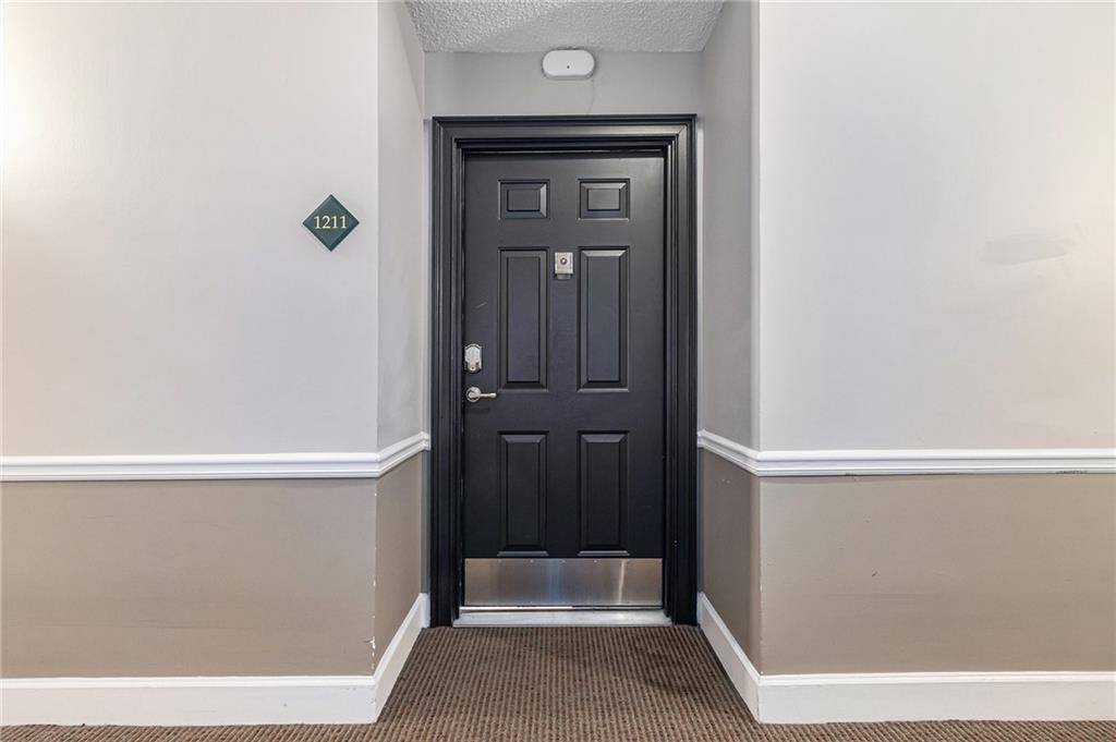 220 Renaissance Parkway Northeast, Unit 1211 Atlanta, GA 30308 - Photo 6 of 24 a view of front door