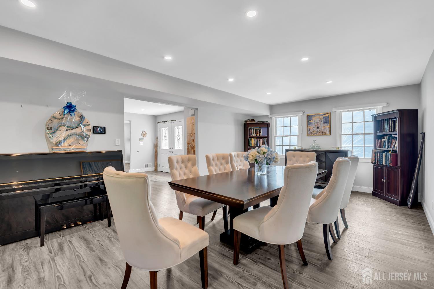 4 Canadian Woods Road Marlboro, NJ 07746 - Photo 14 of 45 a view of a dining room with furniture and wooden floor