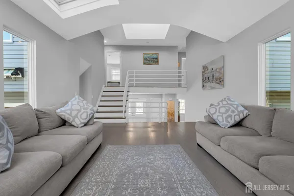 a living room with furniture and a couch