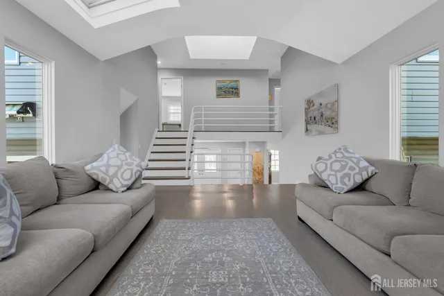 a living room with furniture and a couch