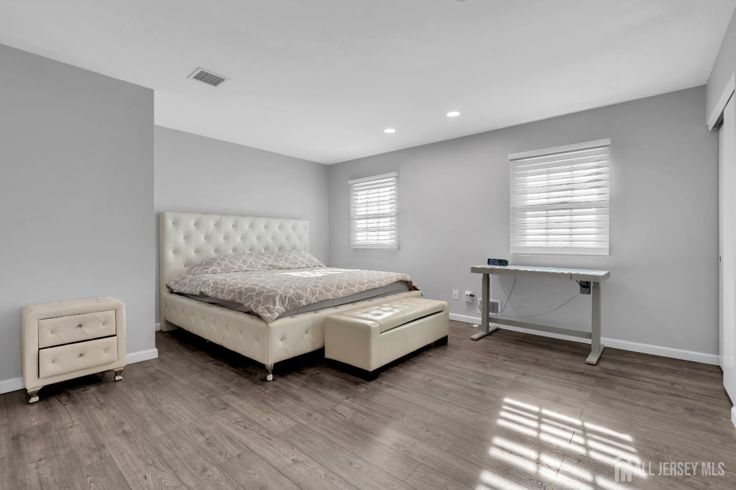 4 Canadian Woods Road Marlboro, NJ 07746 - Photo 27 of 45 a bedroom with a bed and a window