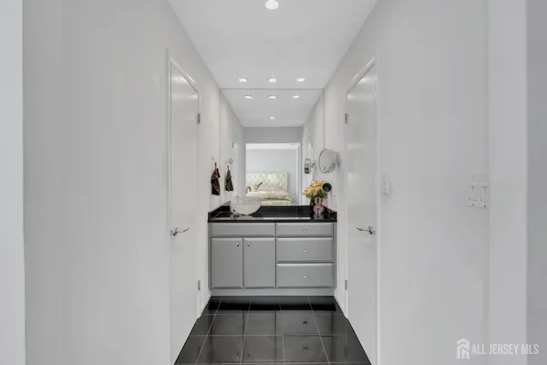 a kitchen with sink cabinets and stove