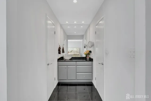 a kitchen with sink cabinets and stove