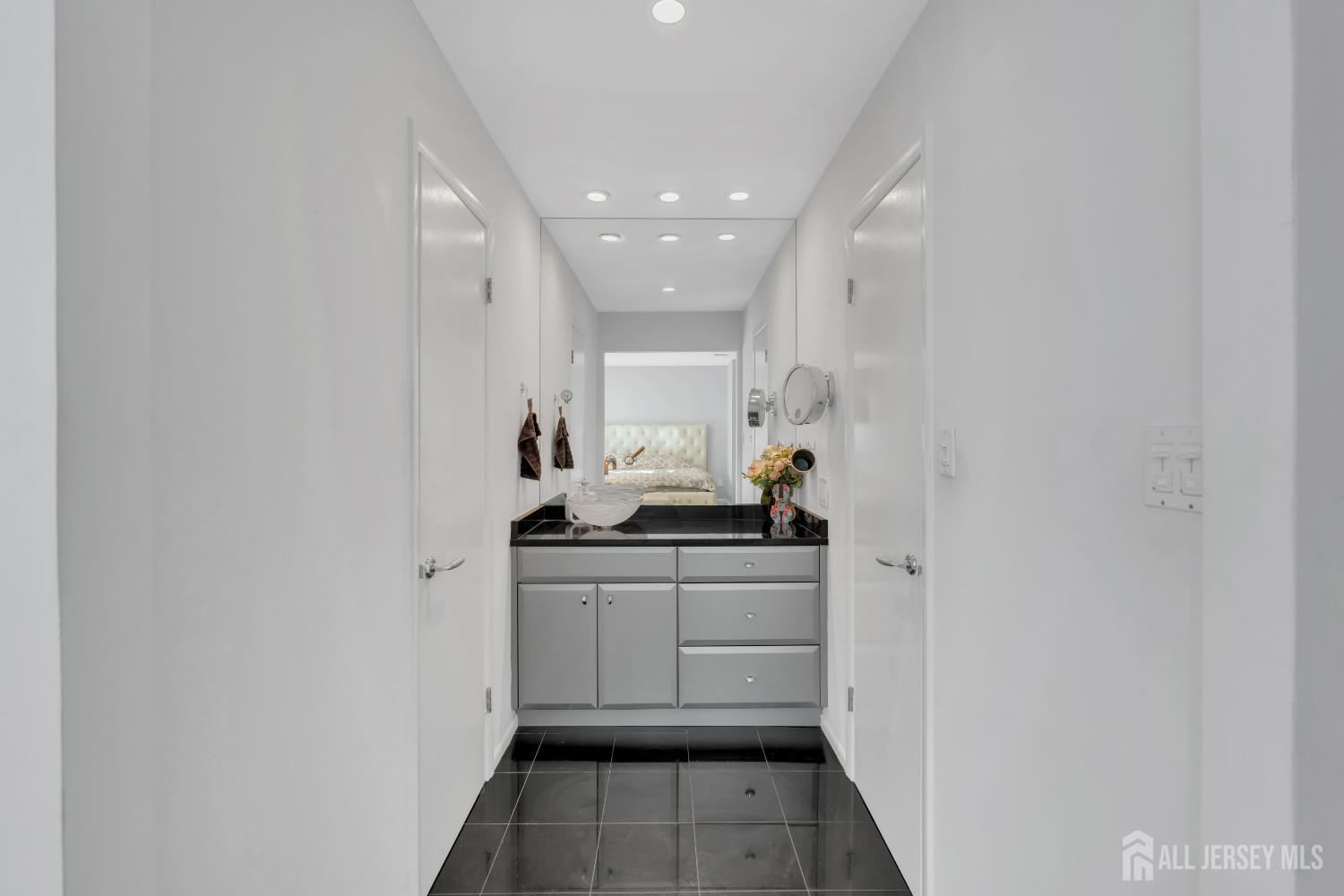4 Canadian Woods Road Marlboro, NJ 07746 - Photo 29 of 45 a kitchen with sink cabinets and stove