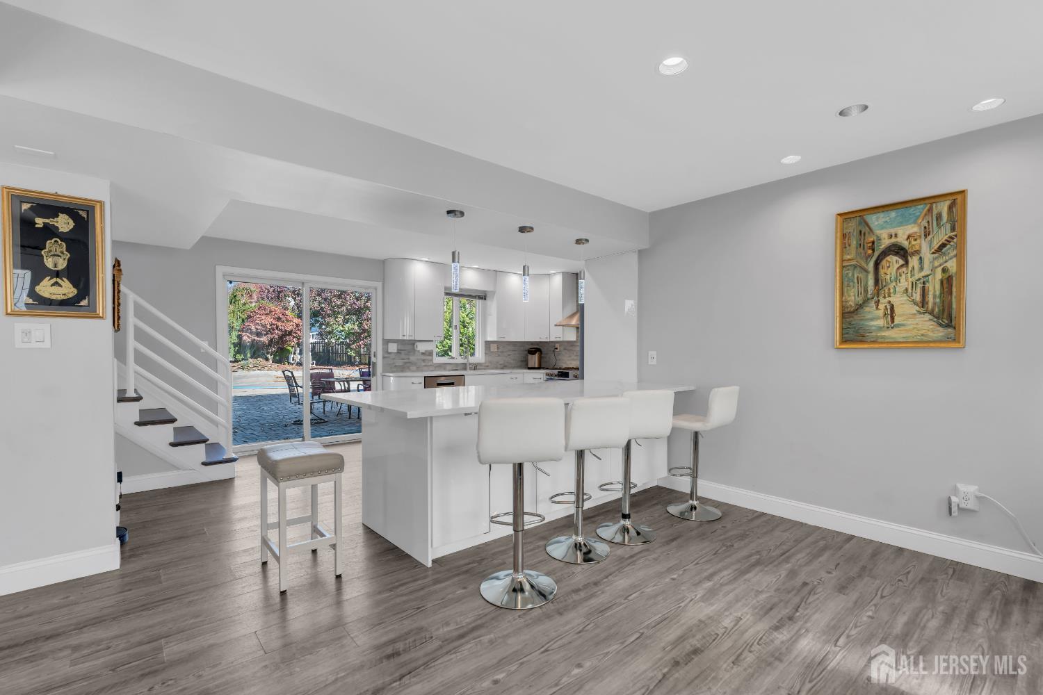 4 Canadian Woods Road Marlboro, NJ 07746 - Photo 9 of 45 a living room with furniture and a wooden floor