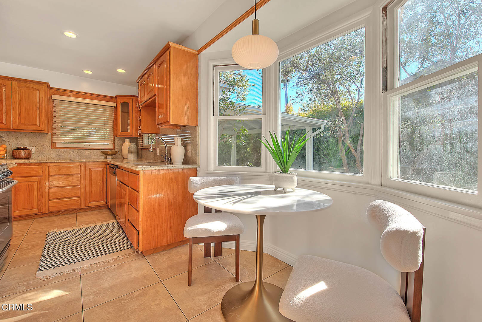3671 Grayburn Road Pasadena, CA 91107 - Photo 14 of 50 a very nice looking dining room with a large window and dining table