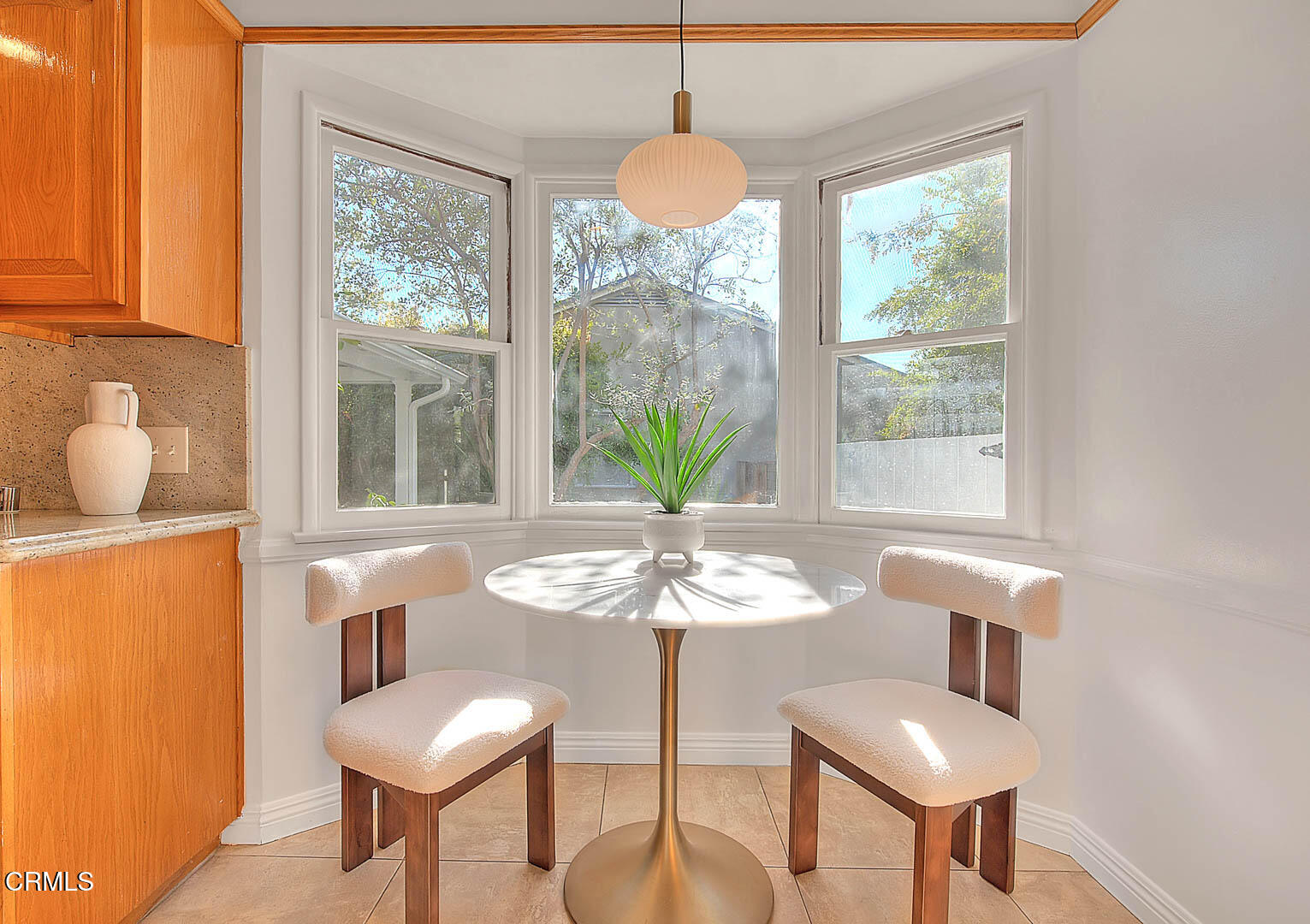 3671 Grayburn Road Pasadena, CA 91107 - Photo 15 of 50 a dining room with furniture and window